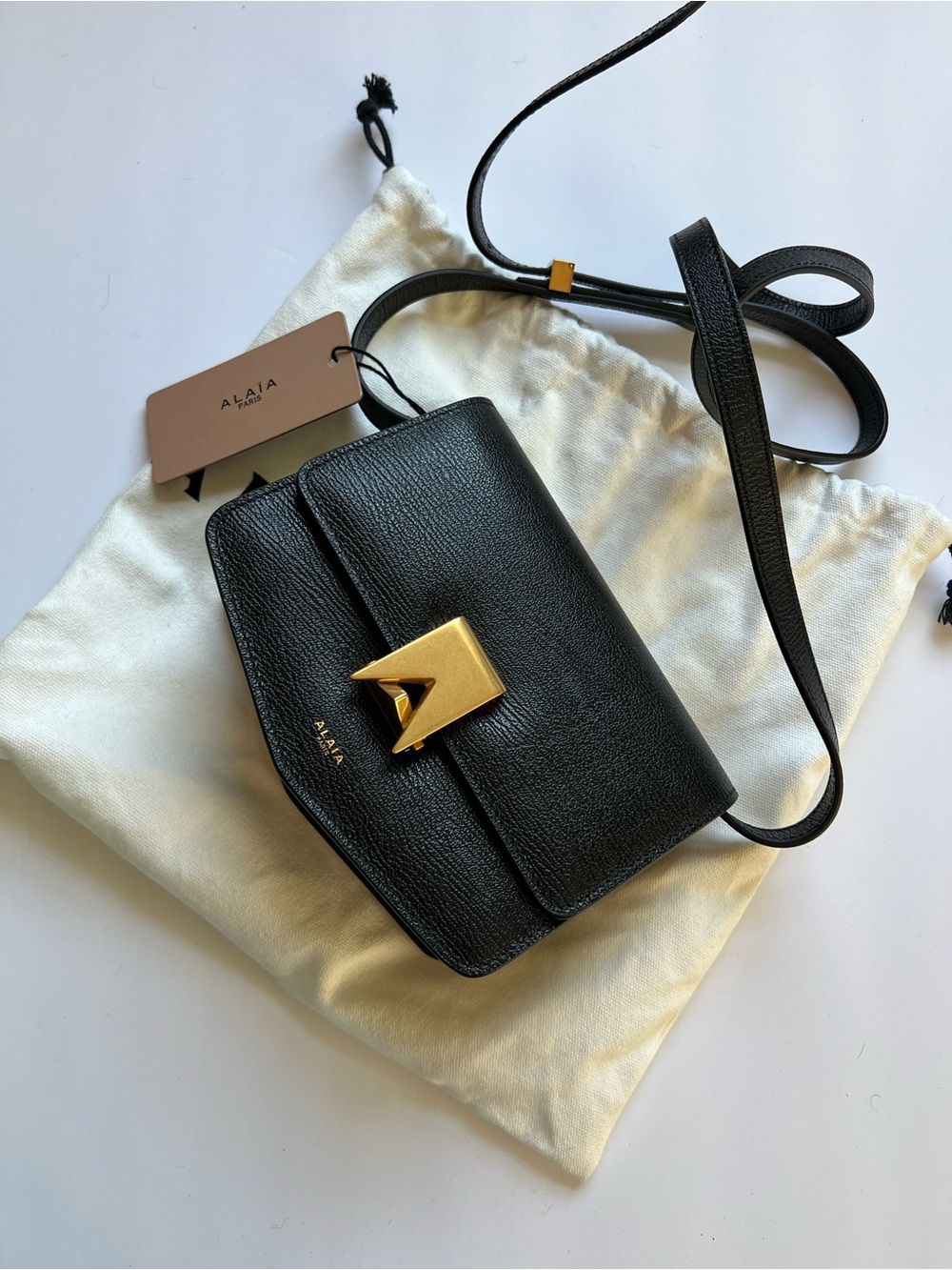 ALAIA Le Pepe Small Black Pebble Leather Crossbody Bag with Gold Hardware